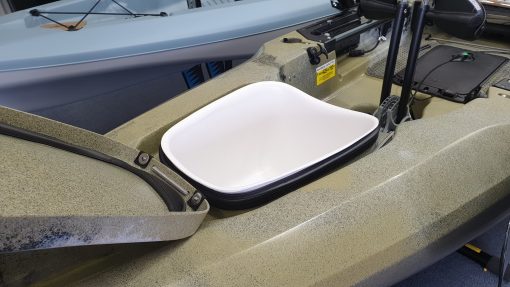 A forward hatch liner bucket shown installed in a Hobie Outback fishing kayak in the HWS shrowroom