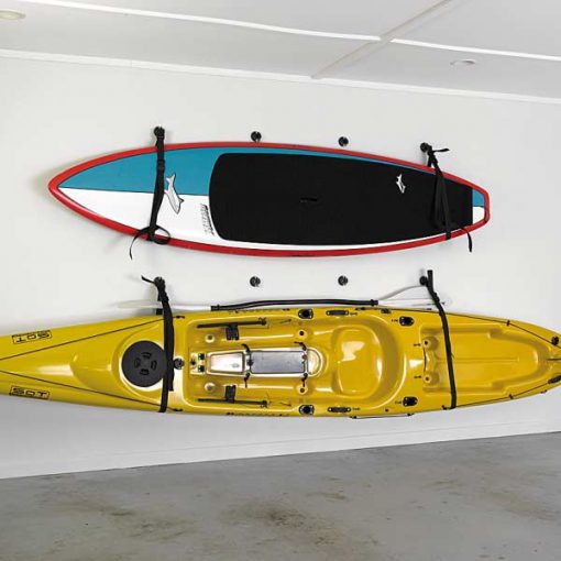 Railblaza StarPort Wall Slings mounting a large kayak and a SUP board to a wall in a garage