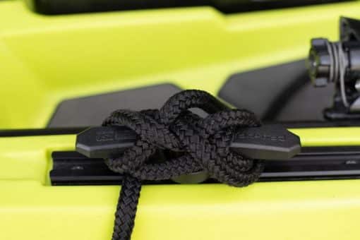 A YakAttack GT Line Cleat XL shown installed on a kayak securing a black anchor line