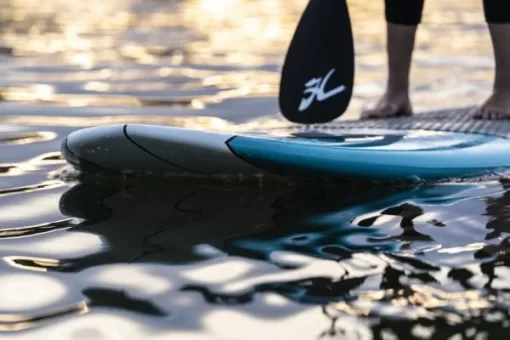 A close up photograph of the Hobie heritage SUP on the water