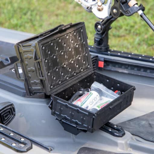 YakAttack TracPak Combo Kit mounted in the cockpit of a fishing kayak. The bottom storage box is open revealing various gear stored inside.