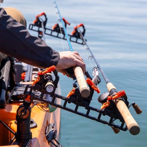 YakAttack Sidestage Pro horizontal rod rack system shown mounted to a kayak and housing three fishing rods